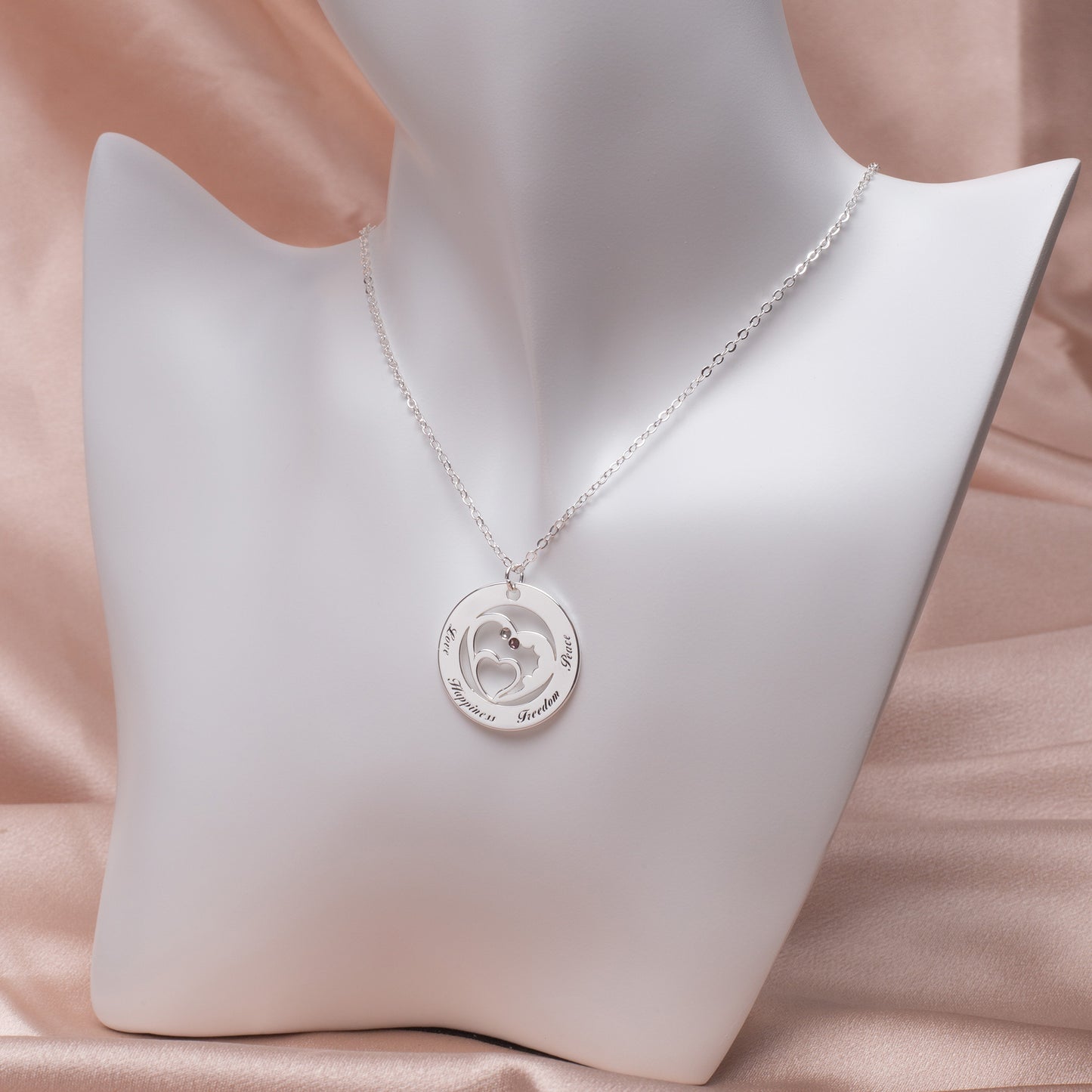 On Model: Woman wearing the diamond heart in circle pendant necklace, showcasing its elegant design and sparkle against her skin.