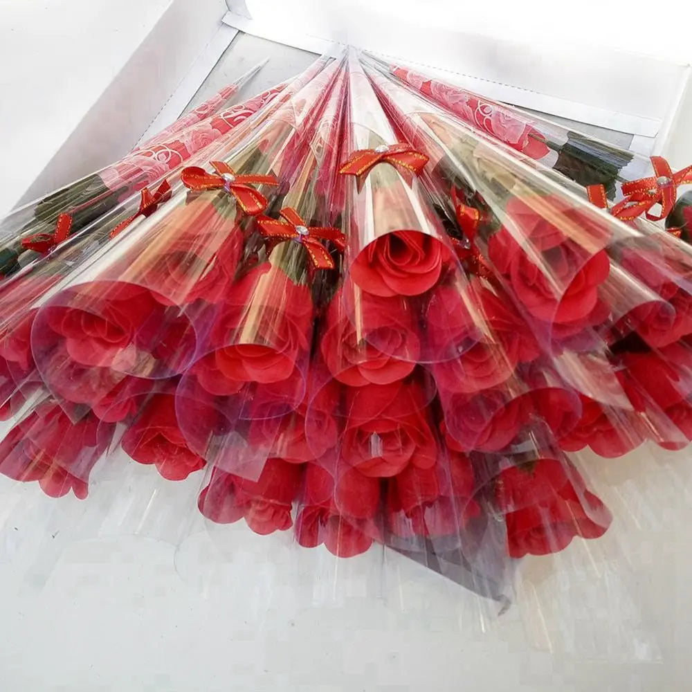 Close-up of red artificial rose head, made of soap.