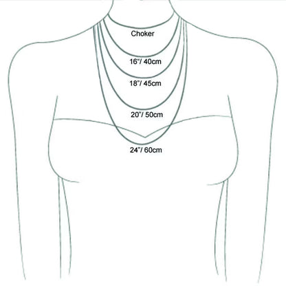 Lifestyle shot: Female model wearing the dainty stainless steel necklace with a casual everyday outfit, demonstrating its versatility. (Shows the product in context and targets usage scenarios)