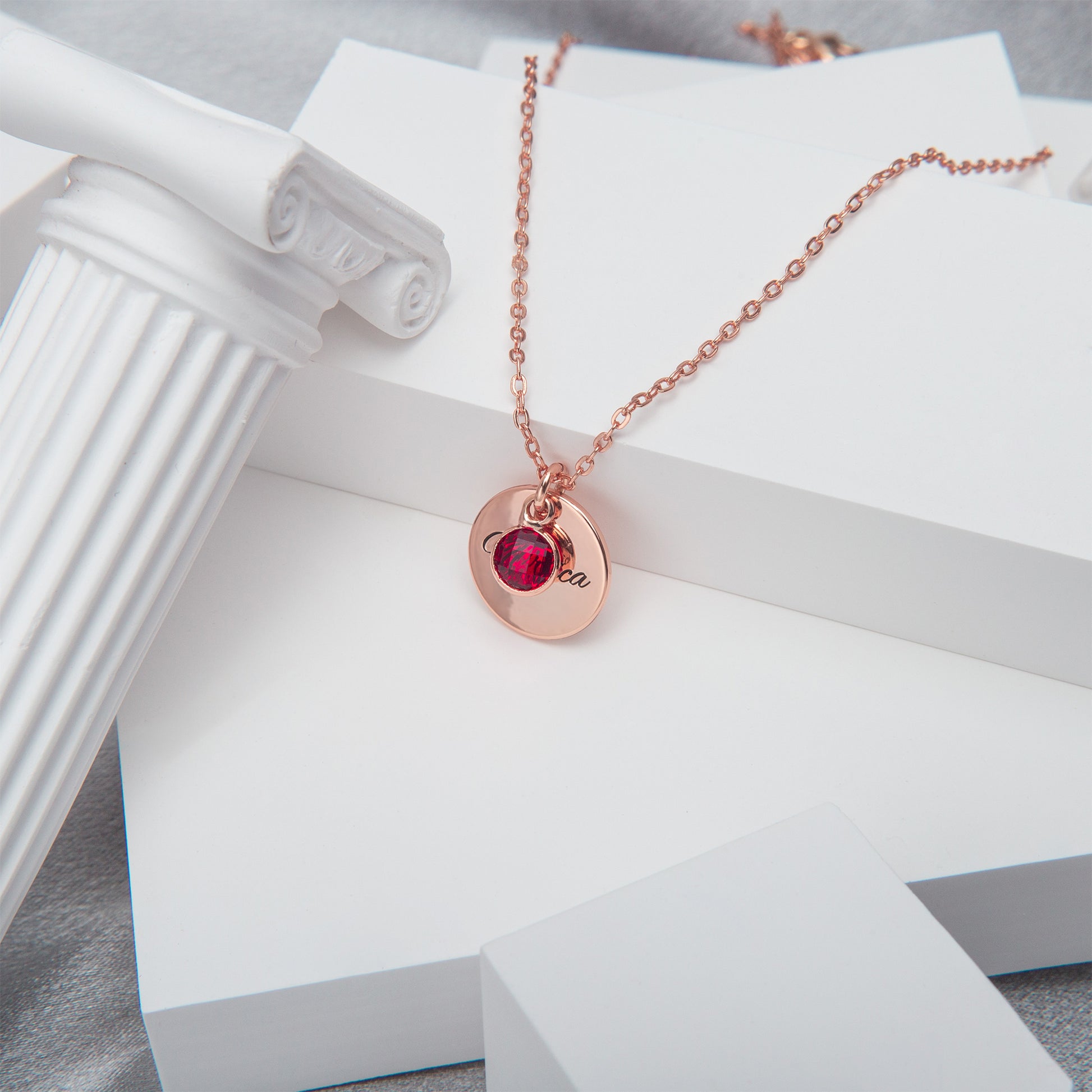 Delicate stainless steel circle necklace featuring a vibrant [Birthstone Name/Color] birthstone.Gift box included, ideal for birthdays or anniversaries. (Emphasizes material, occasion, and gift box inclusion)