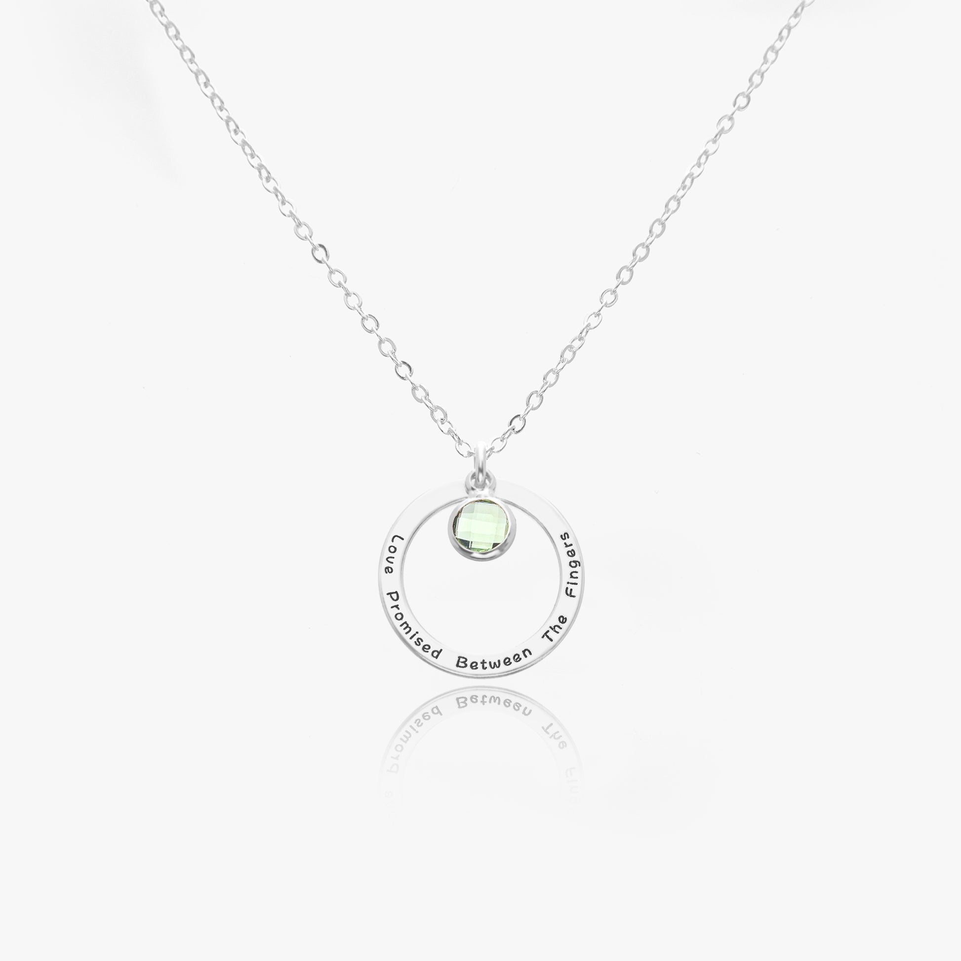 Personalized birthstone necklace made of stainless steel, showcasing [Birthstone Name/Color] birthstone. Presented in a gift box.