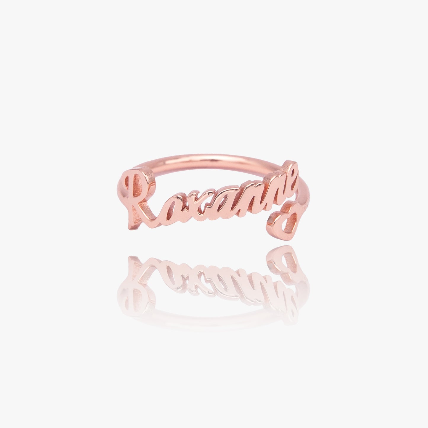 Close-up of a Personalized Heart Name Ring in stainless steel, showcasing the engraved name [Name Example - if applicable] and the adjustable band. Displayed in an open gift box.