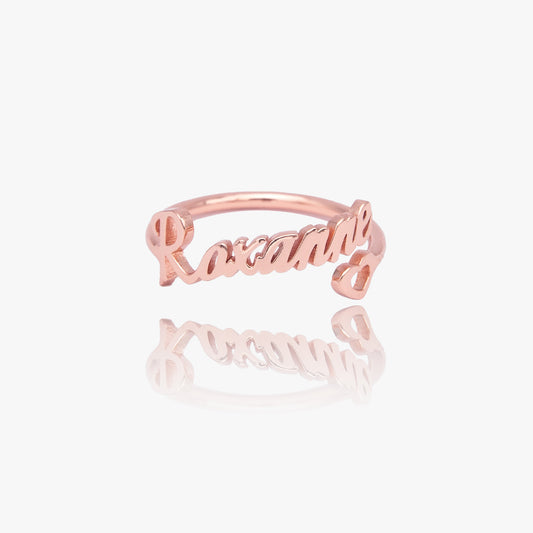 Close-up of a Personalized Heart Name Ring in stainless steel, showcasing the engraved name [Name Example - if applicable] and the adjustable band. Displayed in an open gift box.