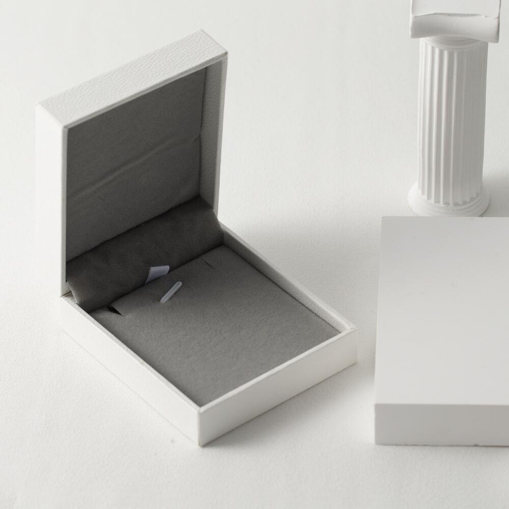 Stackable Name Ring in Silver - Open Gift Box Presentation.Personalized with "[Example Name]": This variation rearranges the information, leading with the "stackable" and "silver" aspects.It maintains clarity and provides a concise description.