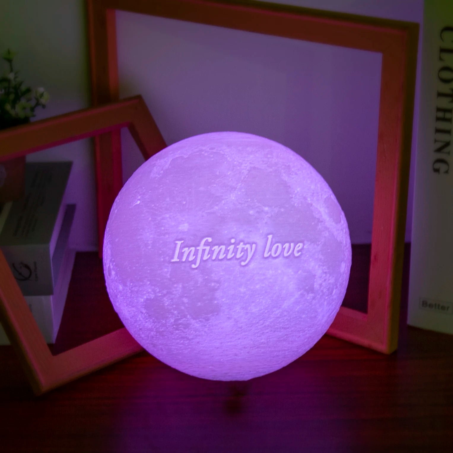 Custom Moon Lamp: Displaying personalized text engraved below the photo.