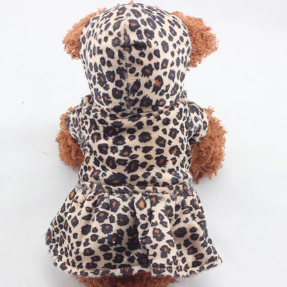 Close-up of the leopard print side of the reversible dog coat (Size Small). Soft cotton blend fabric.