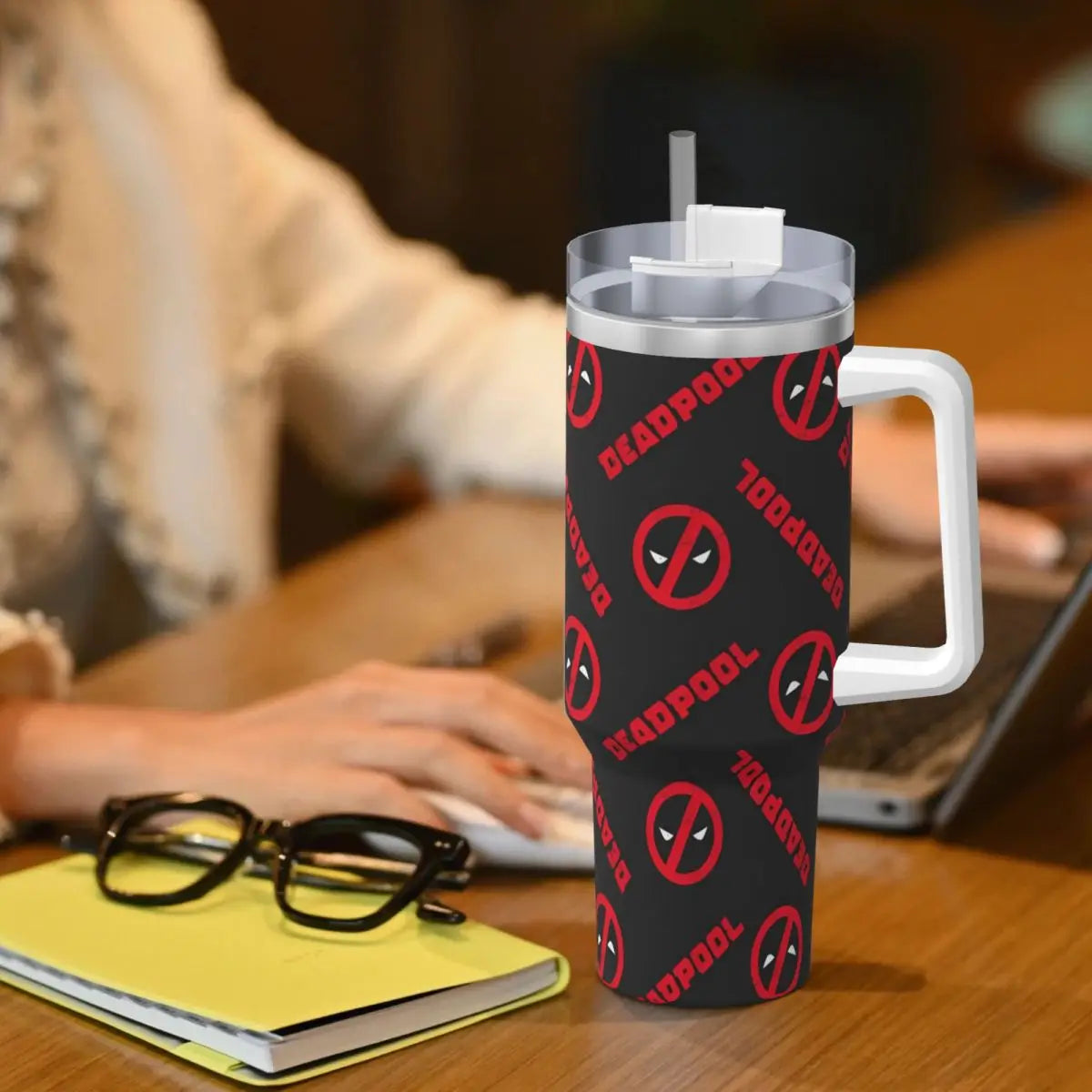 Detailed view of the Deadpool design on the 40oz Stanley-style tumbler.