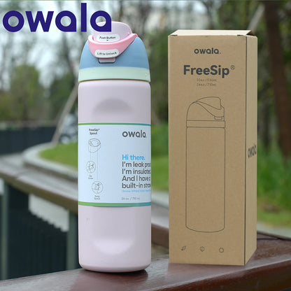 Owala FreeSip Stainless Steel Water Bottle, 32 oz, Granite, Closed Lid, Showing Carry Loop