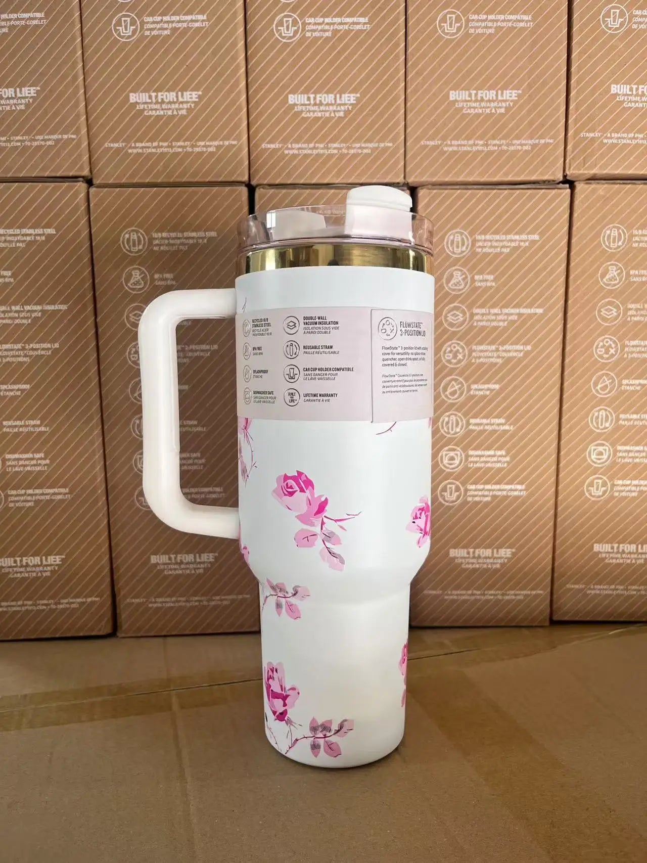 40oz insulated travel mug, pink, with handle and straw.