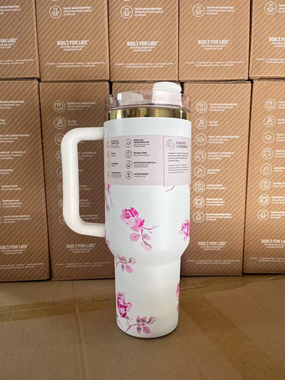 40oz insulated travel mug, pink, with handle and straw.