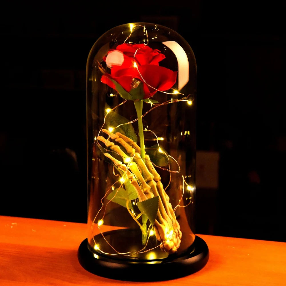 Eternal rose in glass dome with LED lights, close-up view, Valentine's gift