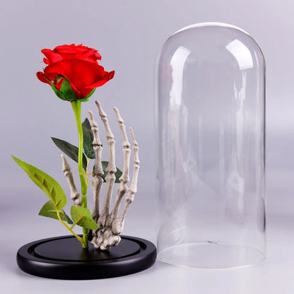 Eternal rose in glass dome with LED lights, close-up view, Valentine's gift