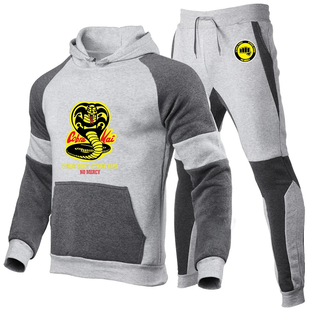 Cobra Kai joggers for men, close-up, ankle cuffs, soft cotton blend material.