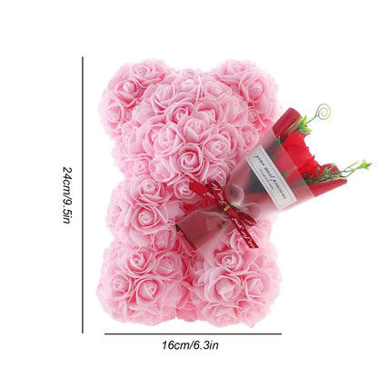 Rose bear in clear gift box, side view, red artificial roses