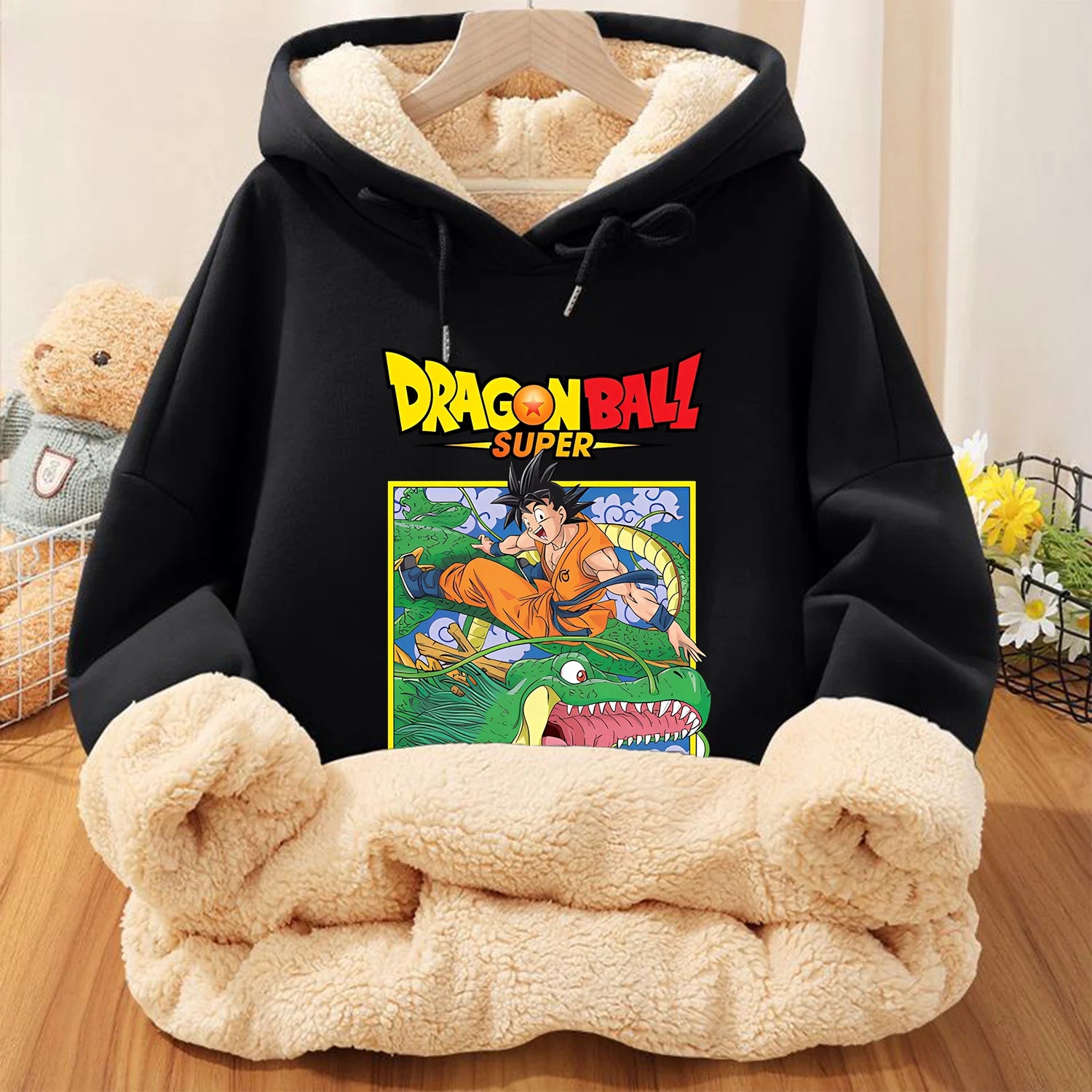 Dragon Ball Z Goku hoodie for kids, close-up of Goku graphic, vibrant colors, black fleece, officially licensed.