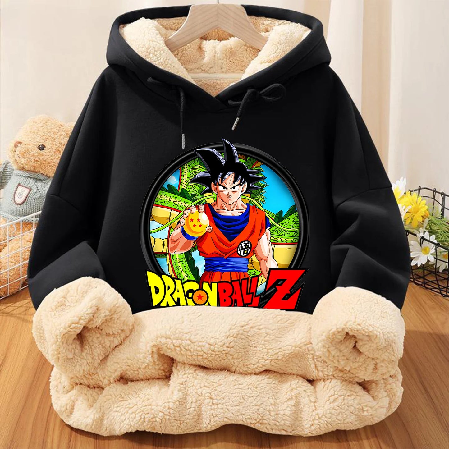 Dragon Ball Z Goku hoodie for kids, close-up of Goku graphic, vibrant colors, black fleece, officially licensed.