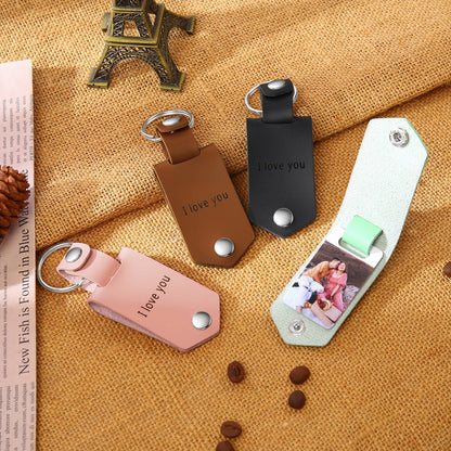 Personalized heart-shaped photo keychain with stainless steel and leather, a perfect Valentine's Day gift for her.