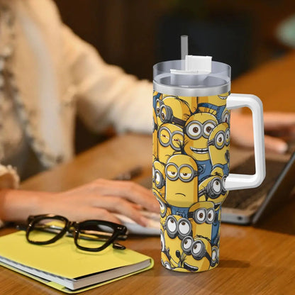 Minions insulated tumbler, top view, showing lid opening and straw, with Minion design.