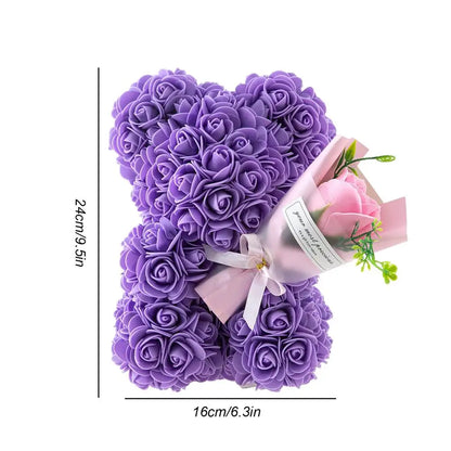 Top view of rose bear, delicate foam flowers, romantic Valentine's gift.