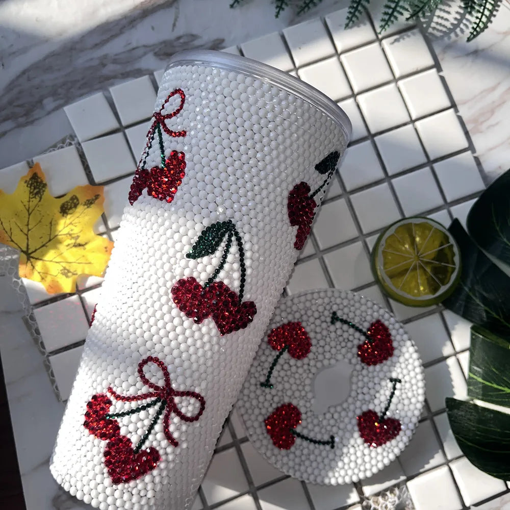 White 22oz tumbler, red cherries, rhinestone detail, handmade, includes straw.