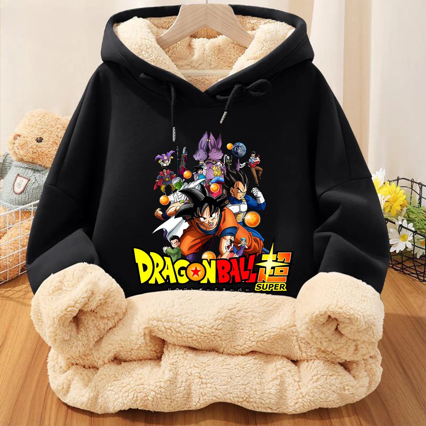 Dragon Ball Z Goku hoodie for kids, detail of the hood and zipper, black fleece, official Bandai merchandise.