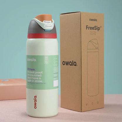 Owala 32oz Insulated Stainless Steel Water Bottle in Seafoam Green, showcasing triple-layered insulation.