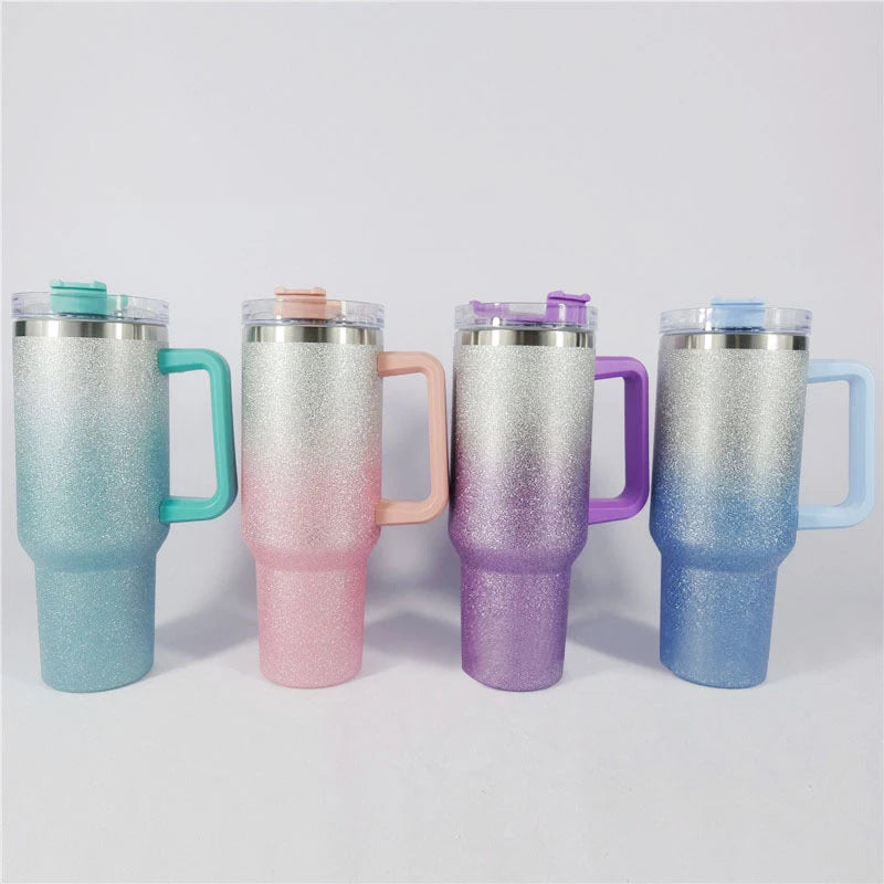 DUTRIEUX 40oz insulated tumbler with handle and straw, rainbow glitter, angled product shot.