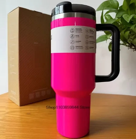 30oz insulated travel mug, stainless steel construction, with straw lid, shown in red.