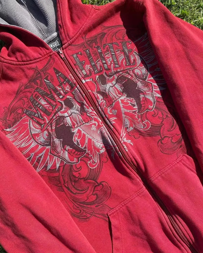 Close-up of skull and snake print on red Y2K couple hoodie.