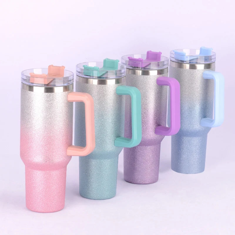 DUTRIEUX 40oz insulated tumbler with a vibrant rainbow glitter gradient design, handle, and straw.