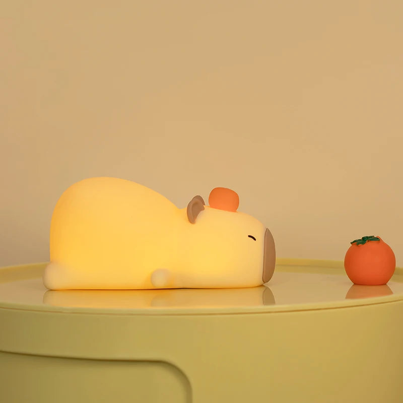 Cute capybara lamp, touch-sensitive, adjustable brightness.