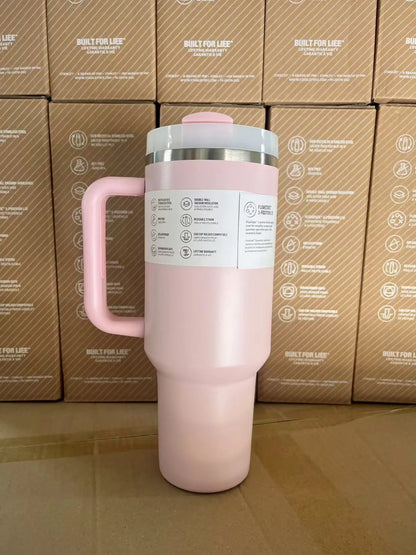 40oz insulated travel mug, pink, with handle and straw.