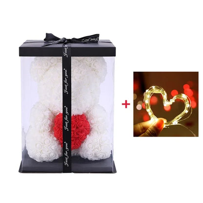 Rose Bear Gift: 25cm LED Teddy with artificial flowers, boxed.