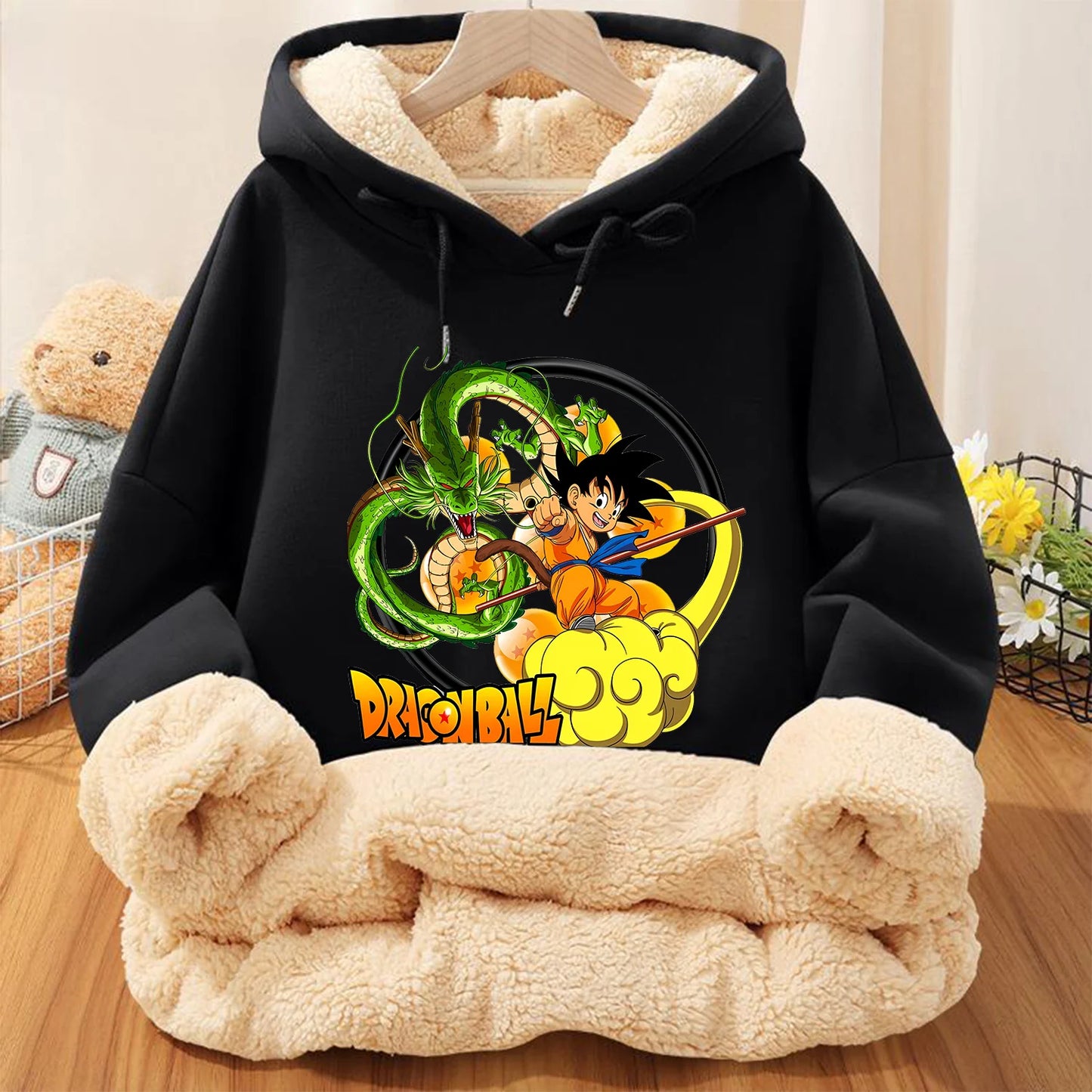 Dragon Ball Z Goku hoodie for kids, side view showing sleeve detail, black fleece, official Bandai product.