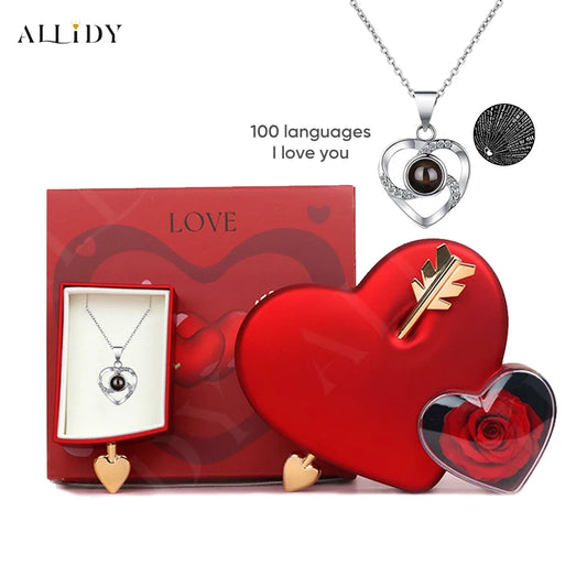 Heart-piercing preserved rose in an acrylic jewelry box with a 100 languages I love you projection necklace, a unique and romantic Valentine's Day gift.