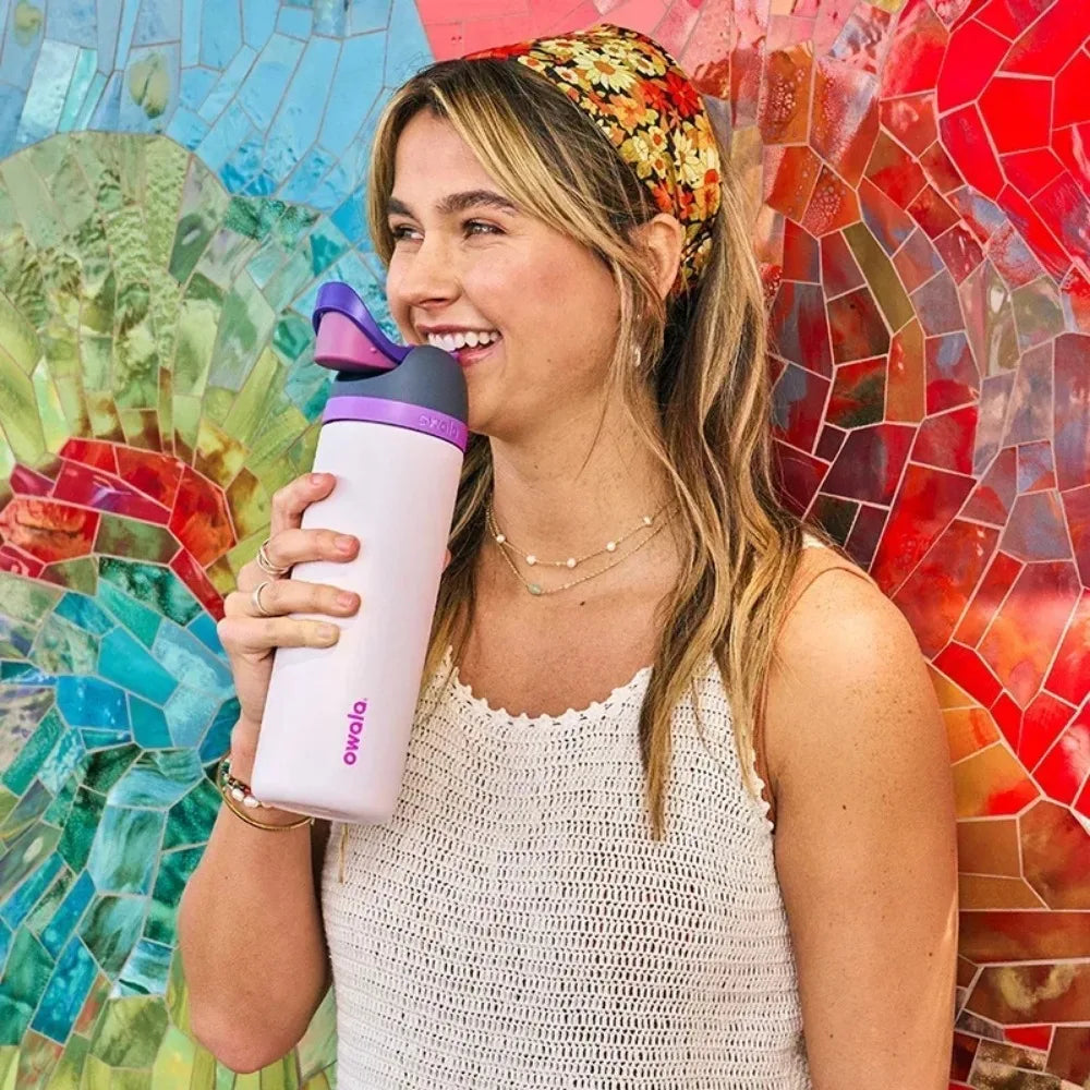 Owala Flip 19oz Tumbler in Lilac Purple, Demonstrating One-Handed Opening.