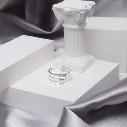 Three sterling silver stackable name rings with "Mom," "Grandma," and "Nana" engravings, a thoughtful gift for Mother's Day. (Illustrates multiple rings, specific engravings, and suggests a gifting occasion)