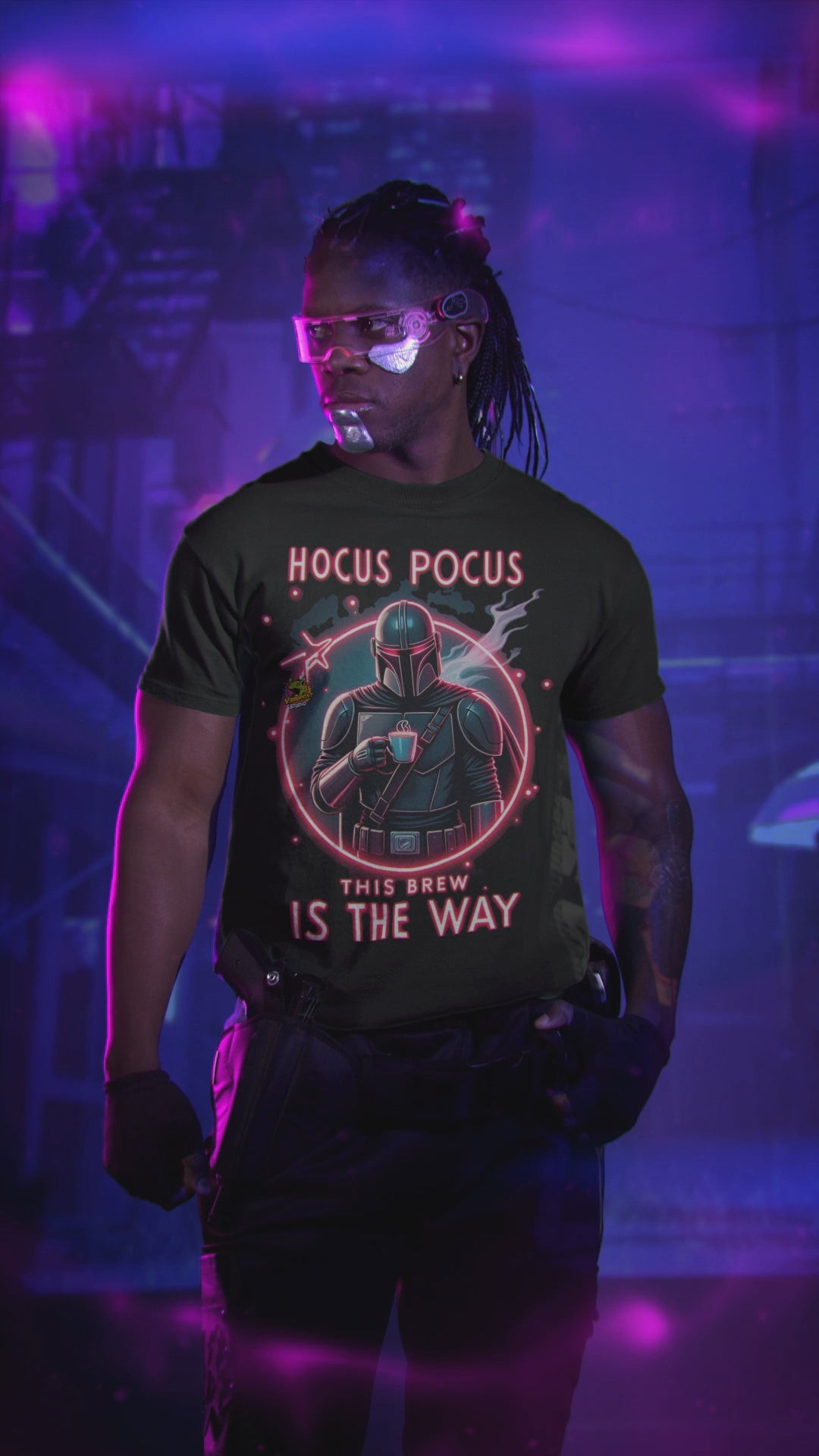 Load video: Black t-shirt featuring a &#39;Hocus Pocus This Brew Is the Way&#39; design with a Mandalorian-inspired character, showcased in a dynamic product video. This trendy, eye-catching t-shirt is perfect for pop culture enthusiasts and collectors, highlighted in a visually striking video to appeal to fans of fantasy and space-themed merchandise